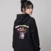 Back view of a woman wearing the black Distracted Keanu raglan hoodie by Keanu Organics