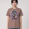 Woman wearing the Kaffa Coffee Flow State Garment-Dyed Tee, front view