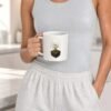 Lotus Paw Mug held by model