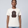 Woman wearing the Vintage White Mahavatar Blessing Organic Tee, front view showing the Mahavatar Keanu blessing design