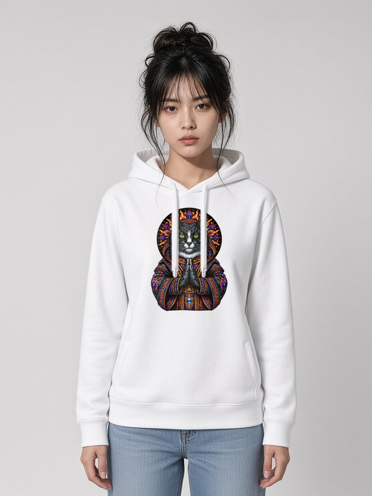 Woman wearing the White Mahavatar Blessing Side-Pocket Hoodie, front view showing the Mahavatar Keanu blessing design