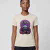 Woman wearing the oatmeal Mahavatar Keanu Ultra Tri-Blend Tee — Keanu in purple shades, paws together under a mandala halo