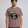 Man wearing the Kaffa Coffee Midnight Curl garment-dyed tee, front view