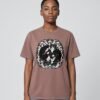 Woman wearing the Kaffa Coffee Midnight Curl garment-dyed tee, front view