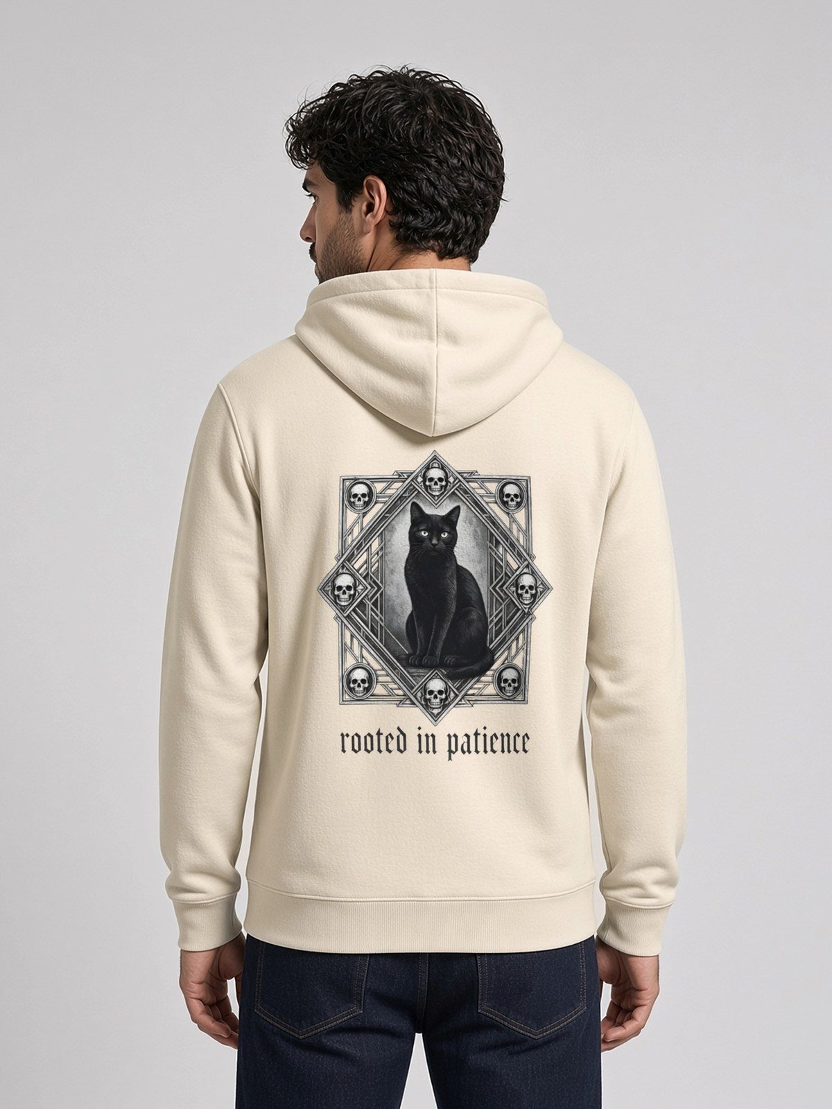 Man wearing the Bone Patience & Poison Midweight Hoodie, back view