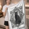 Patience & Poison Sherpa Blanket held by model