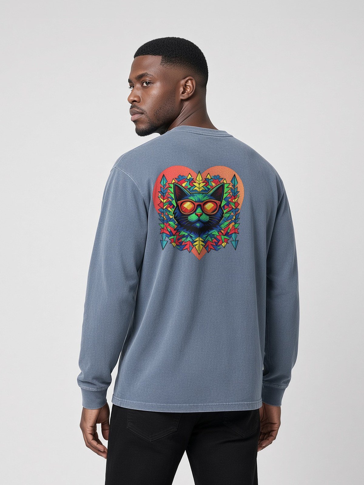 Man wearing the Blue Jean Prism long-sleeve tee, back view showing Keanu in sunglasses inside the prism heart