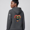 Prism Midweight Hoodie in Anthracite, woman model back: Keanu in sunglasses inside a red-to-orange prism heart with geometric leaves
